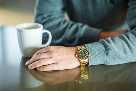 gold rolex outfit